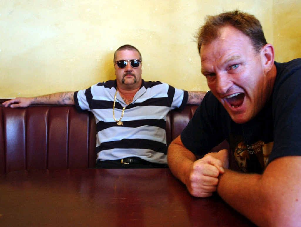 WORD OF MOUTH: Mark ‘Chopper’ Read and Mark ‘Jacko’ Jackson in a publicity shot for their comedy tour in 2003. Pictured left is Chopper’s former bodyguard Mark ‘Hammer’ Dixon. WORD OF MOUTH: Mark ‘Chopper’ Read and Mark ‘Jacko’ Jackson in a publicity shot for their comedy tour in 2003. Pictured left is Chopper’s former bodyguard Mark ‘Hammer’ Dixon.